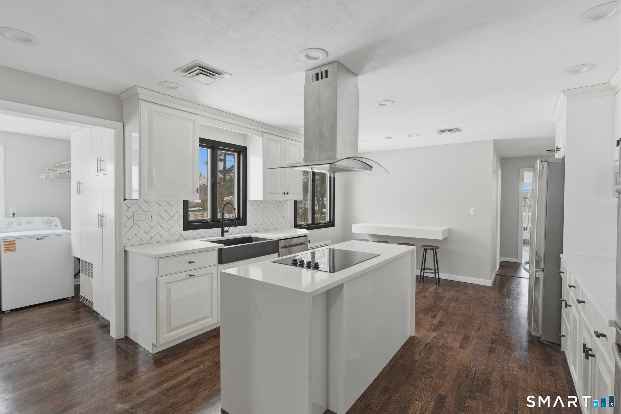 35 West Ridge Drive West Hartford, CT 06117 - Photo 8 of 38 a bathroom with a sink and a mirror