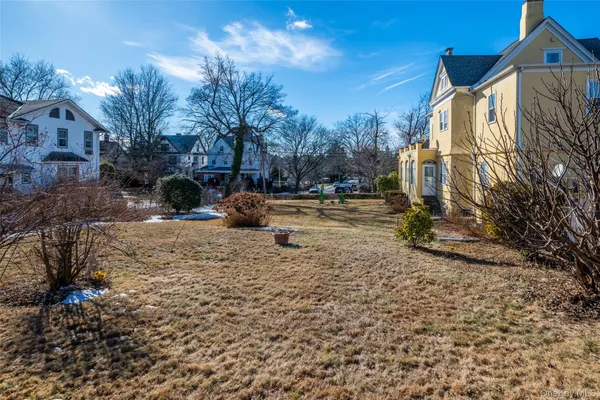 a view of road with a building in the background