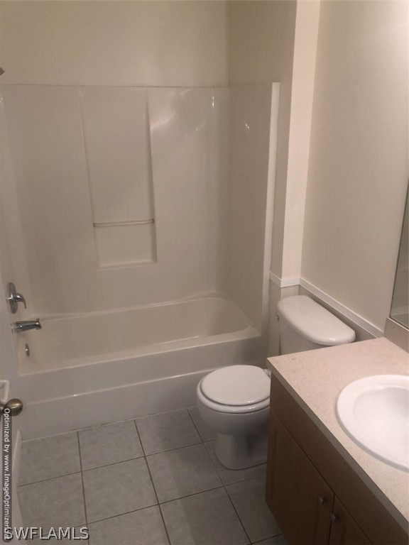 4652 27th Street Southwest Lehigh Acres, FL 33973 - Photo 11 of 21 a bathroom with a sink a toilet and shower