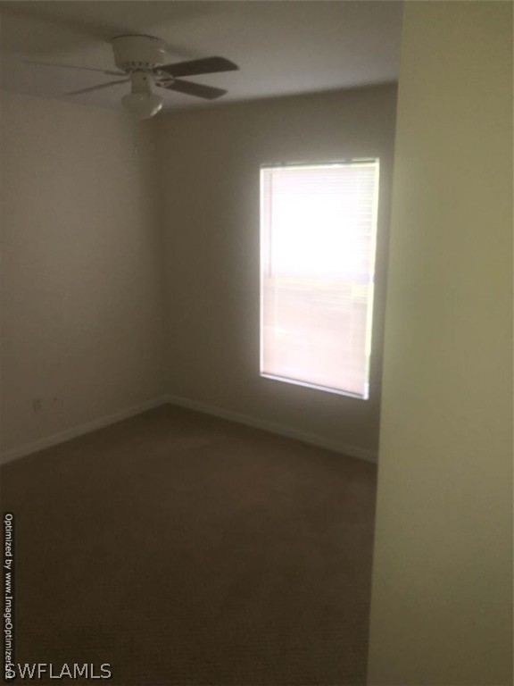 4652 27th Street Southwest Lehigh Acres, FL 33973 - Photo 15 of 21 a view of an empty room with a window