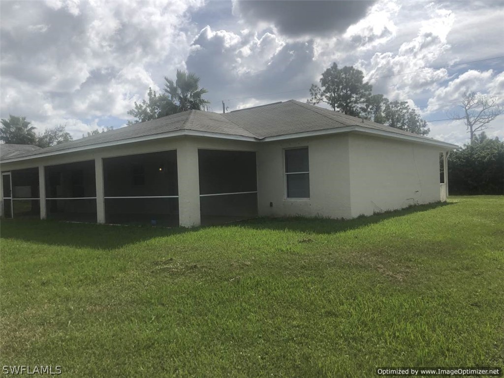 4652 27th Street Southwest Lehigh Acres, FL 33973 - Photo 2 of 21 a view of a backyard