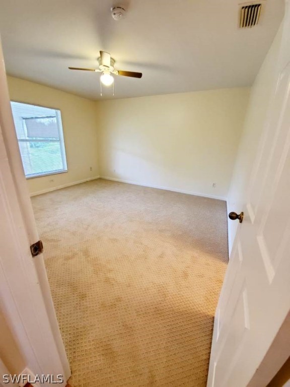 4652 27th Street Southwest Lehigh Acres, FL 33973 - Photo 8 of 21 a view of an empty room