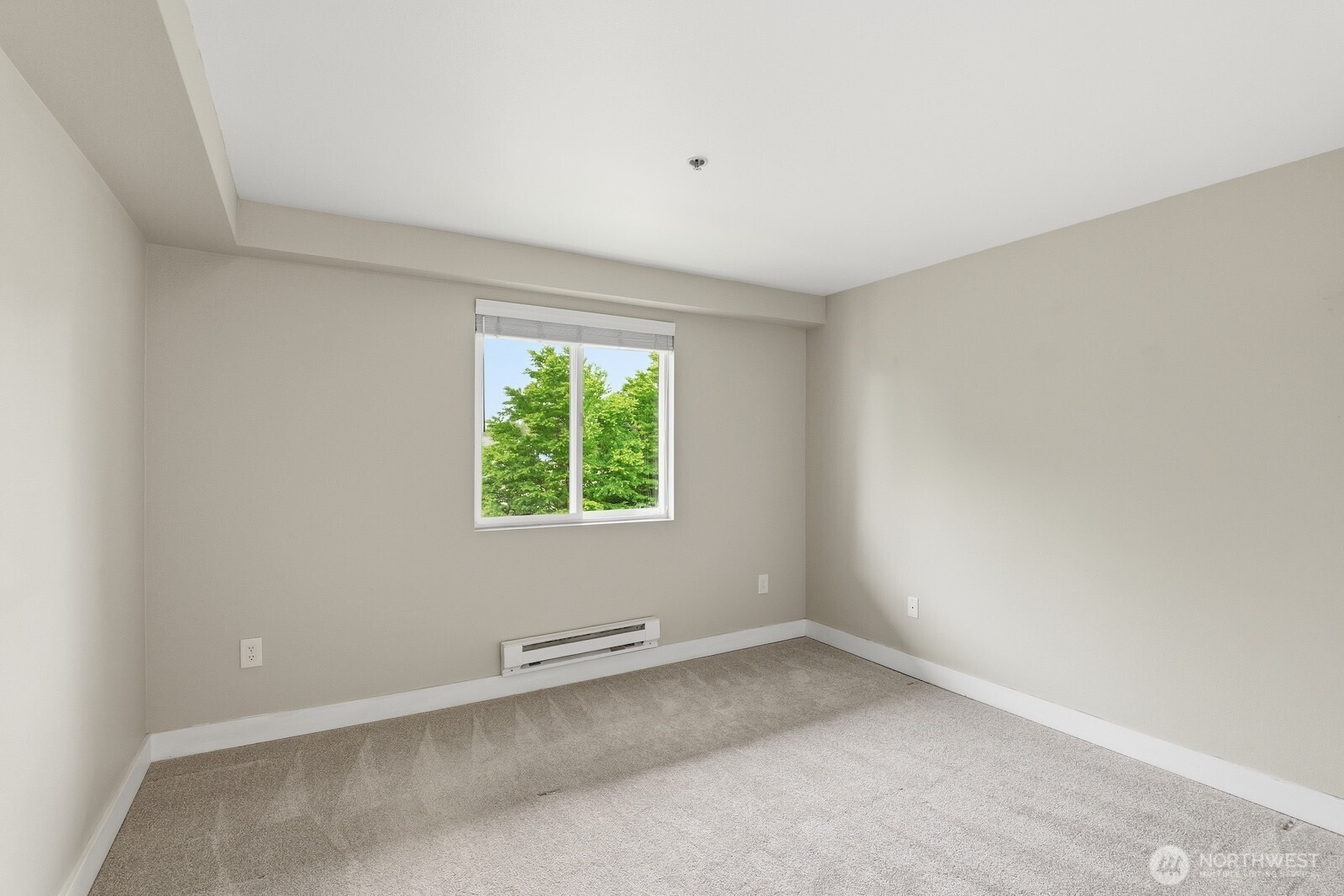 16409 Currie Road Southeast, Unit A308 Monroe, WA 98272 - Photo 17 of 21 an empty room with a window