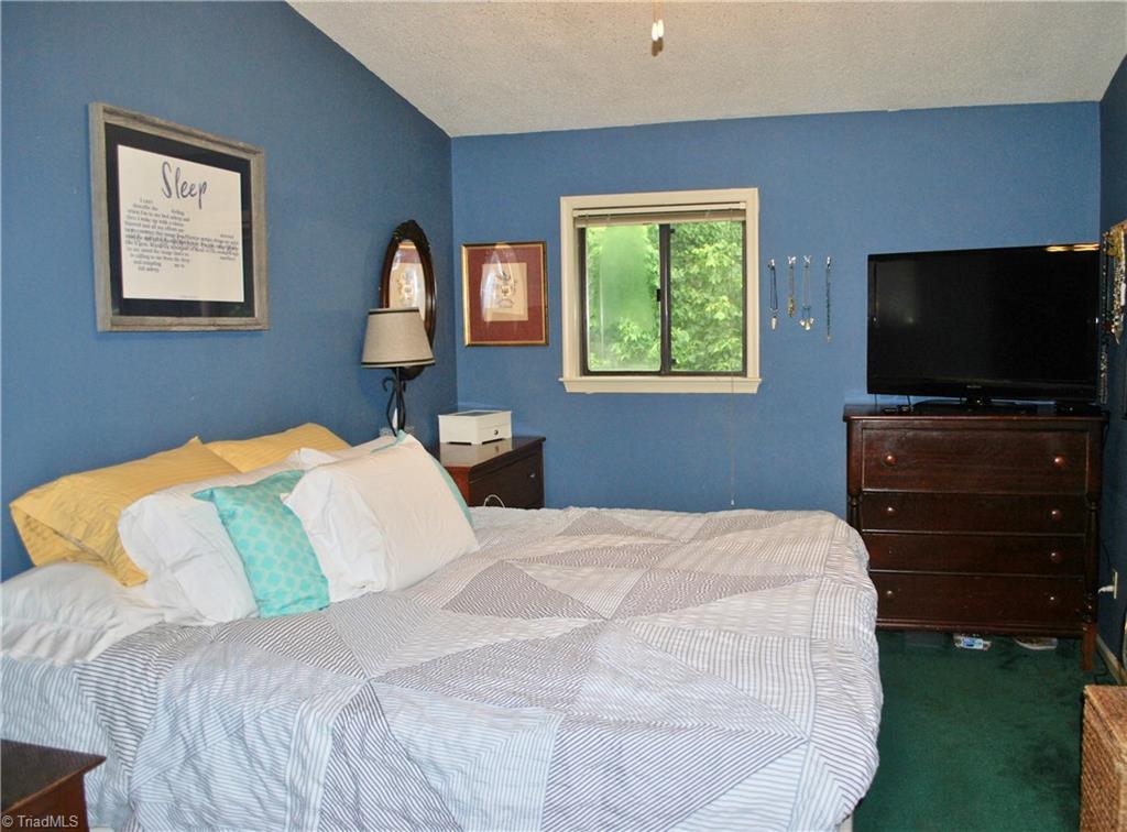 236 Northpoint Avenue, Unit E High Point, NC 27262 - Photo 15 of 26 Large master bedroom easily fits a king sized bed and furniture.