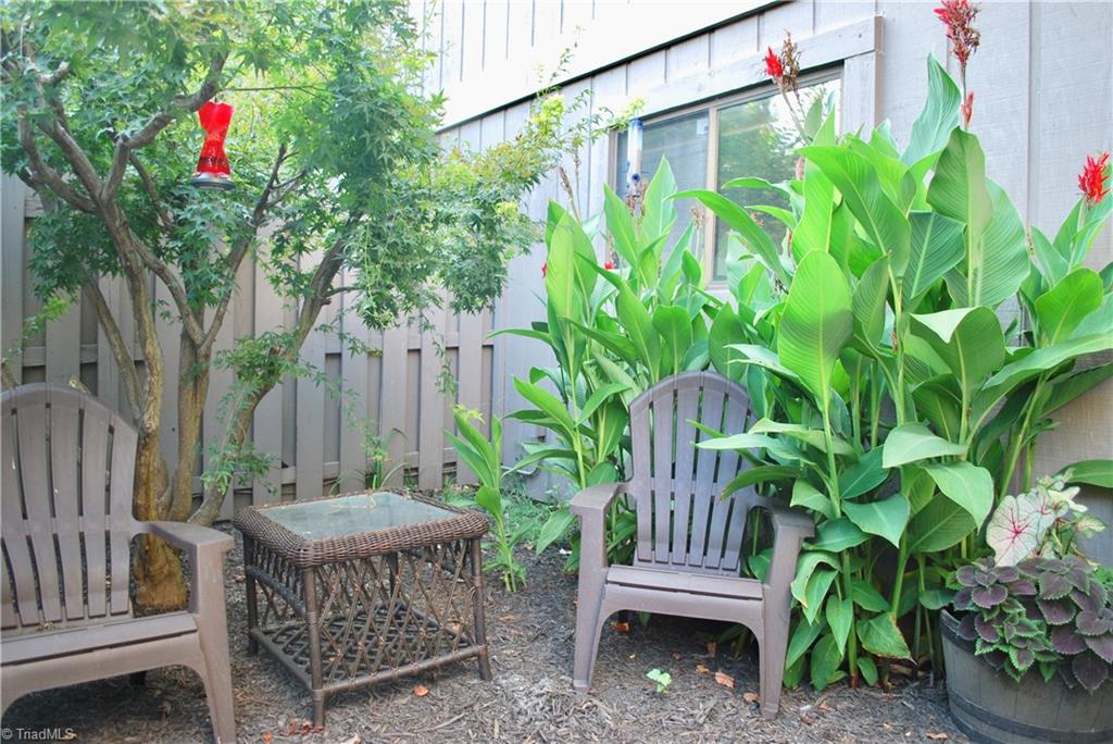 236 Northpoint Avenue, Unit E High Point, NC 27262 - Photo 19 of 26 This courtyard area at your front door entrance is nice way to start the day with a cup of coffee or unwind at the end of the day.
