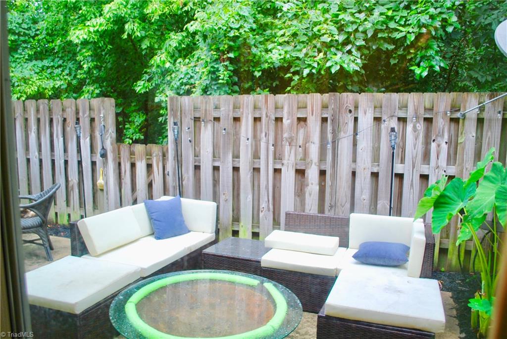 236 Northpoint Avenue, Unit E High Point, NC 27262 - Photo 20 of 26 Private, fenced patio area in the back of the unit has space to hang out or entertain.