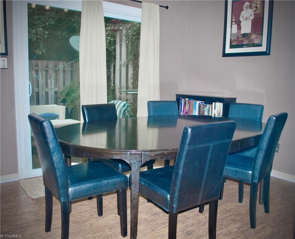236 Northpoint Avenue, Unit E High Point, NC 27262 - Photo 5 of 26 Lots of seating capacity in dining area.