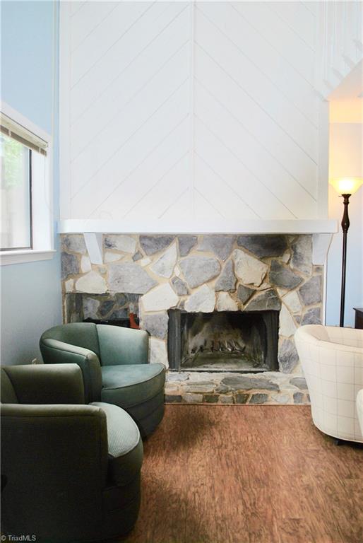 236 Northpoint Avenue, Unit E High Point, NC 27262 - Photo 9 of 26 Cozy up to the fireplace in the living room!