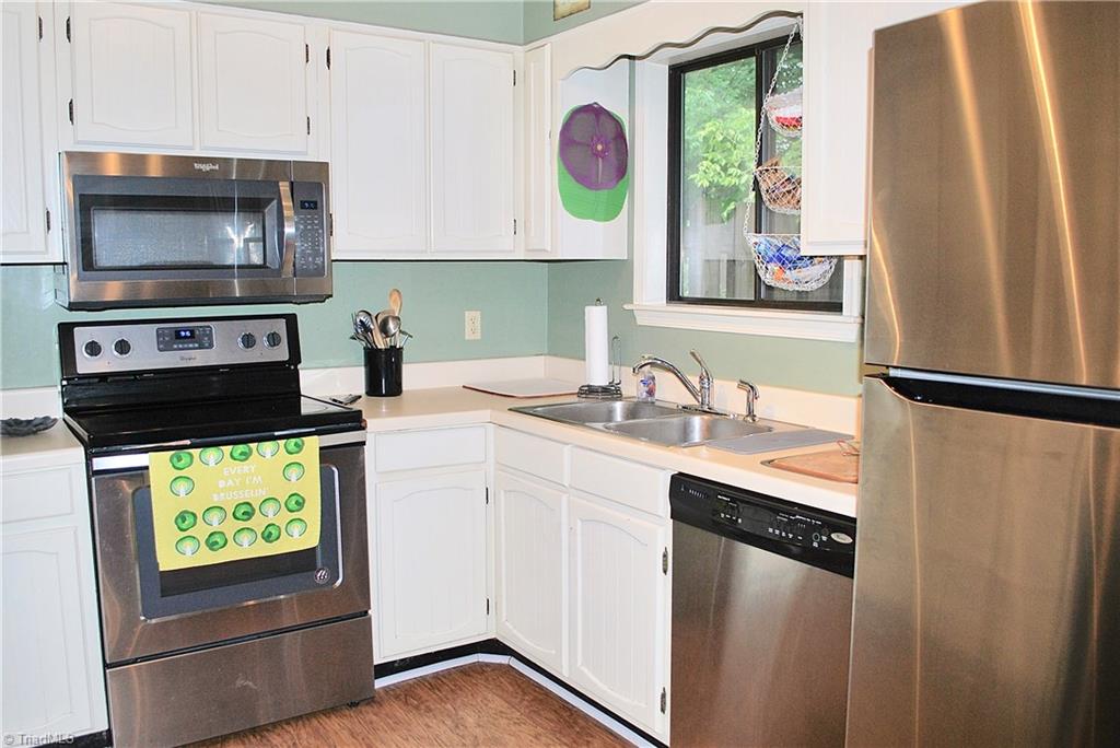 236 Northpoint Avenue, Unit E High Point, NC 27262 - Photo 10 of 26 Kitchen window has view of your private patio area. Appliances convey with acceptable offer.