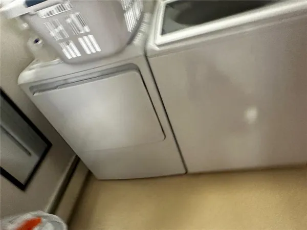 a view of a hallway with staircase