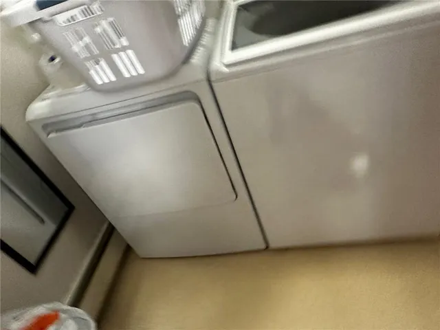 a view of a hallway with staircase