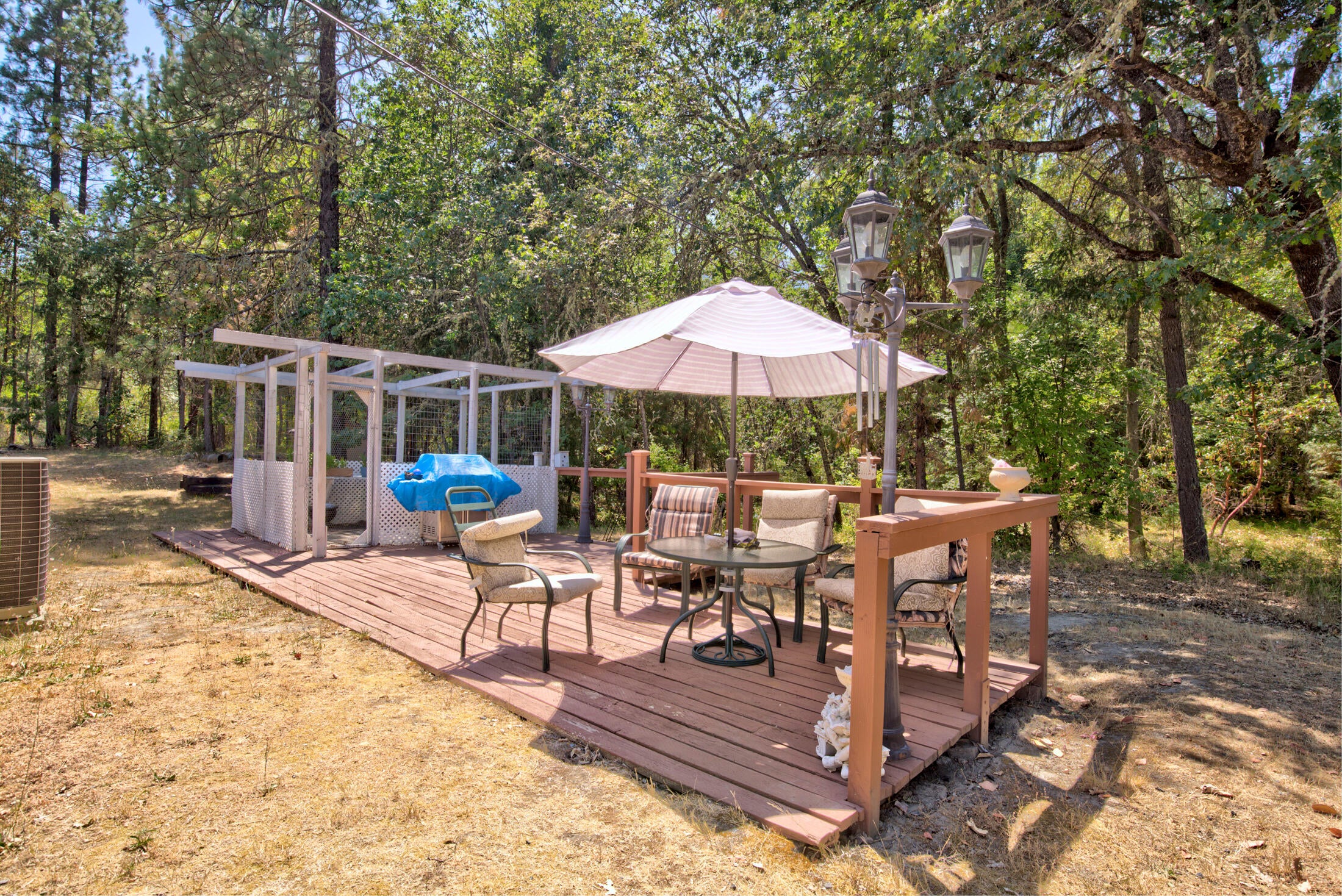 1750 East Fork Road Williams, OR 97544 - Photo 20 of 31 Back Patio with enclosed garden spot