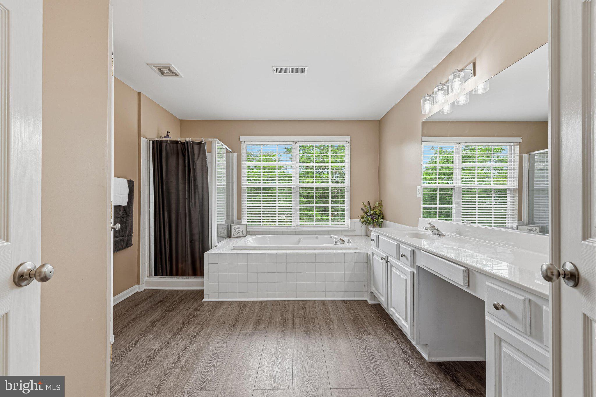 602 Shanks Evans Road Northeast Leesburg, VA 20176 - Photo 25 of 43 Serene bathroom with natural light.