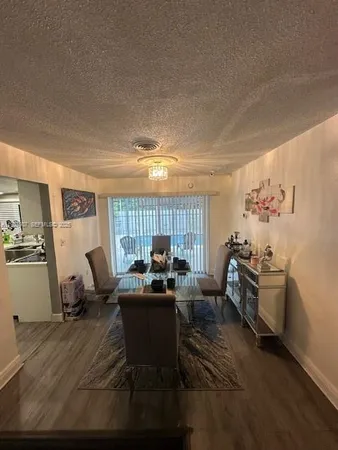 a living room with furniture window and a table