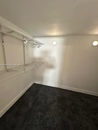 an empty room with an empty space
