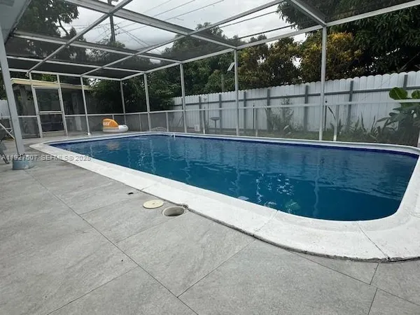 a view of outdoor space with swimming pool