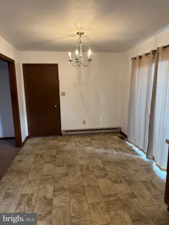 a view of a livingroom with a chandelier