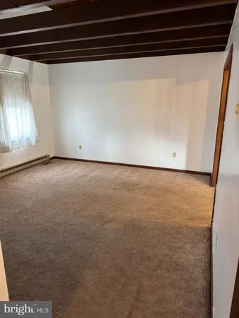 a bathroom with a toilet and a sink