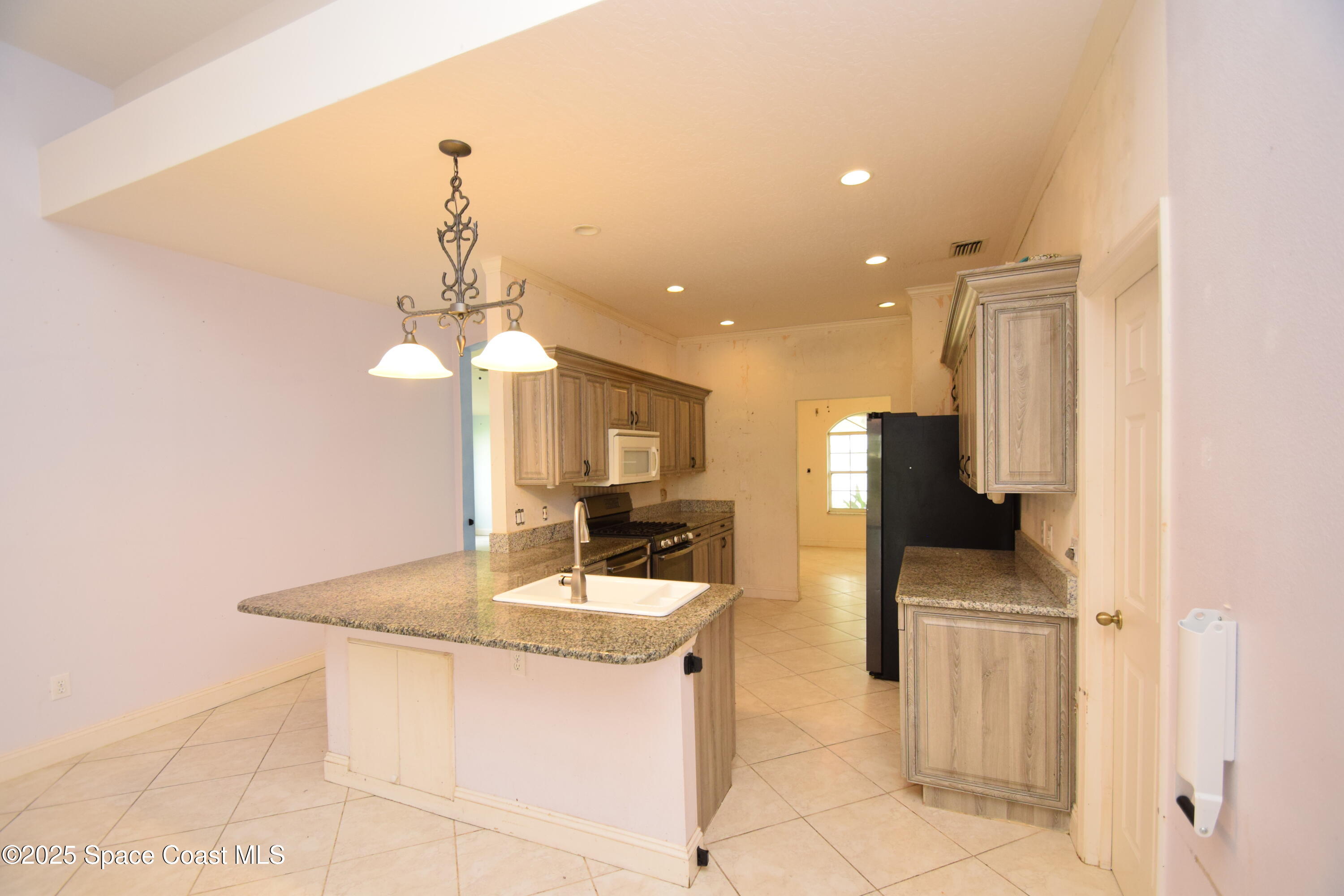 1642 Rustic Way Melbourne, FL 32935 - Photo 16 of 35 Kitchen