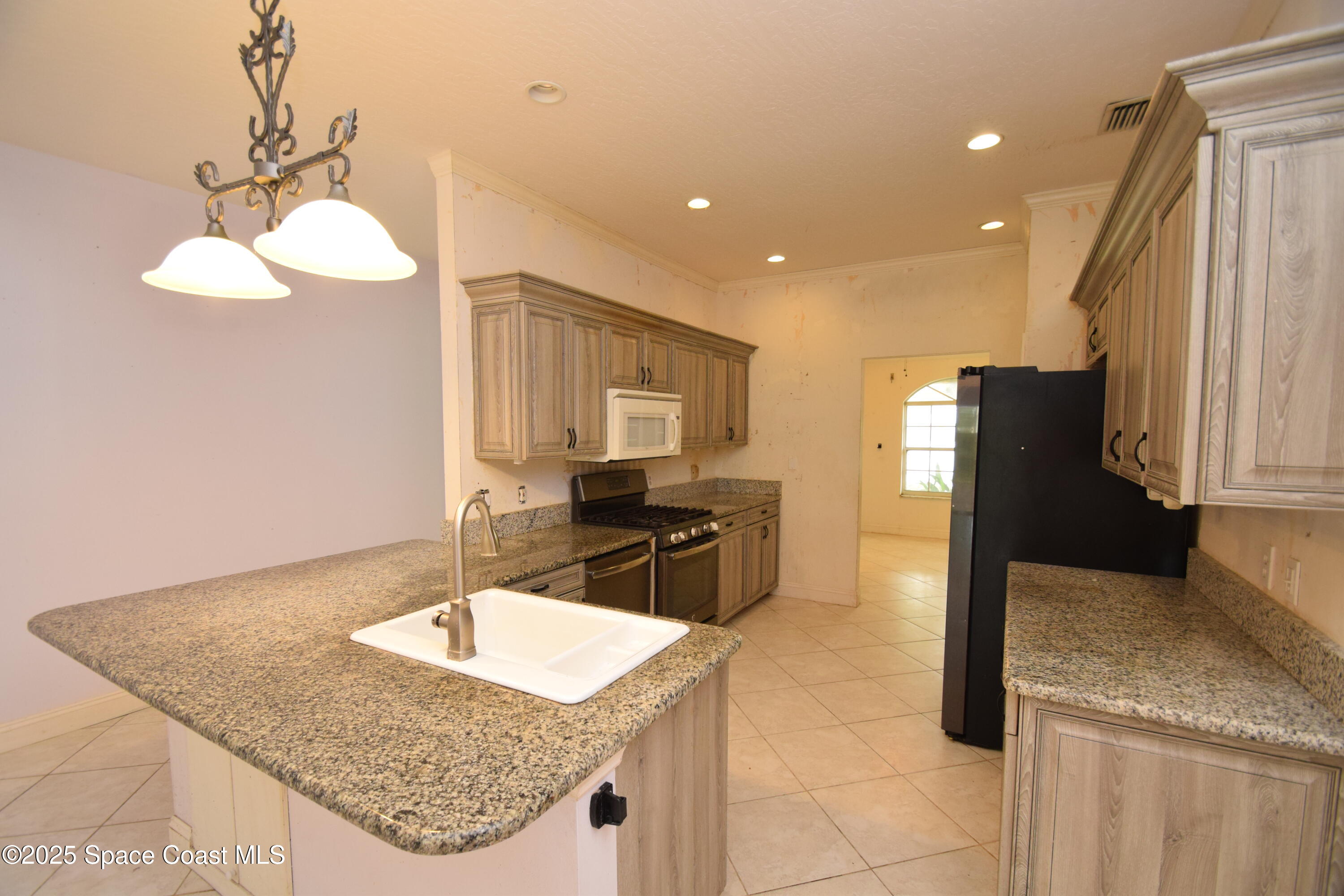 1642 Rustic Way Melbourne, FL 32935 - Photo 17 of 35 Kitchen