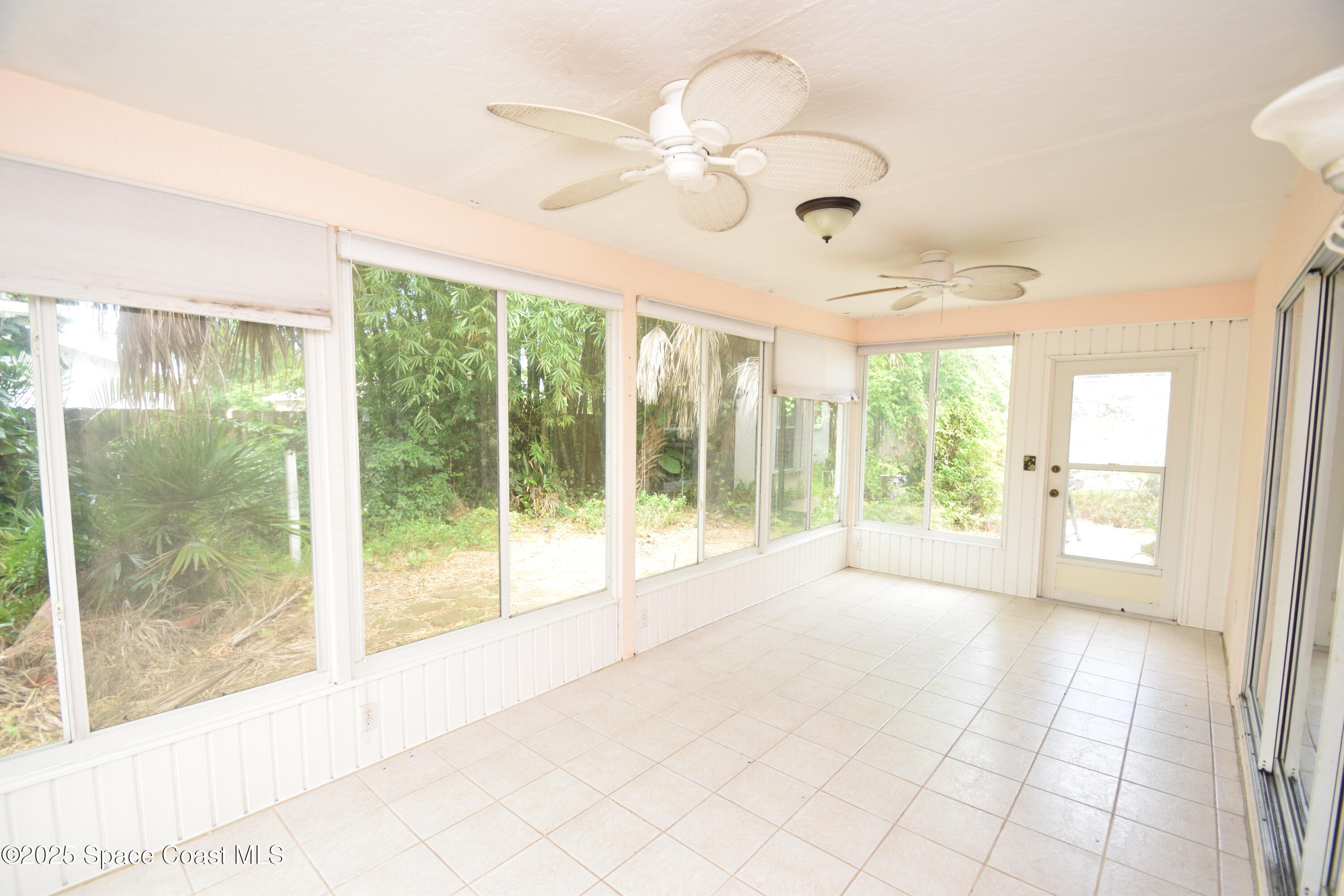 1642 Rustic Way Melbourne, FL 32935 - Photo 35 of 35 Enclosed porch