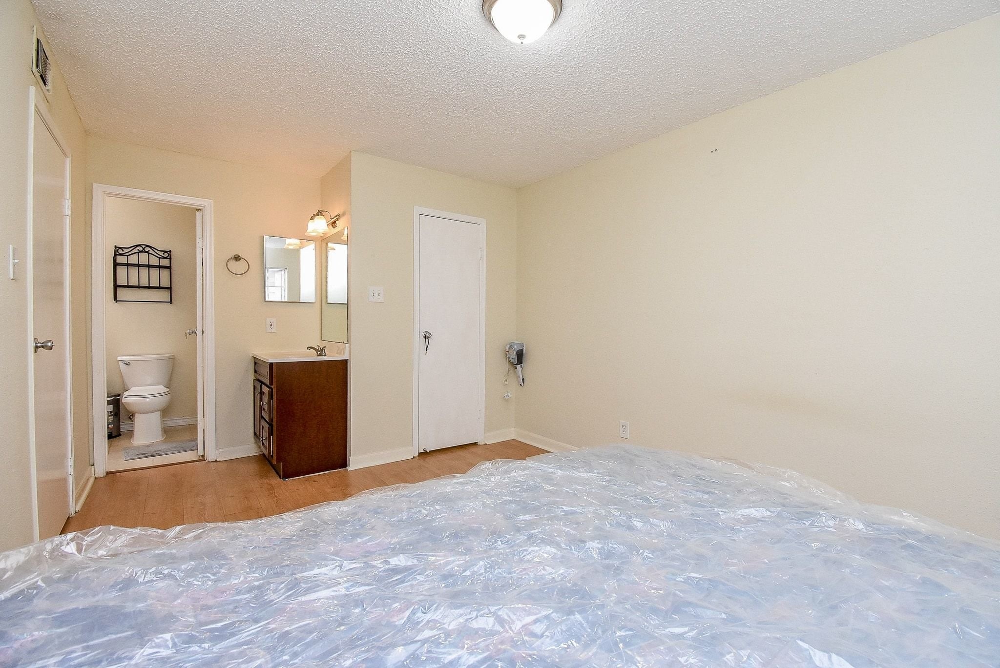 12660 Ashford Point Drive, Unit 507 Houston, TX 77082 - Photo 22 of 28 a view of an empty room with glass door