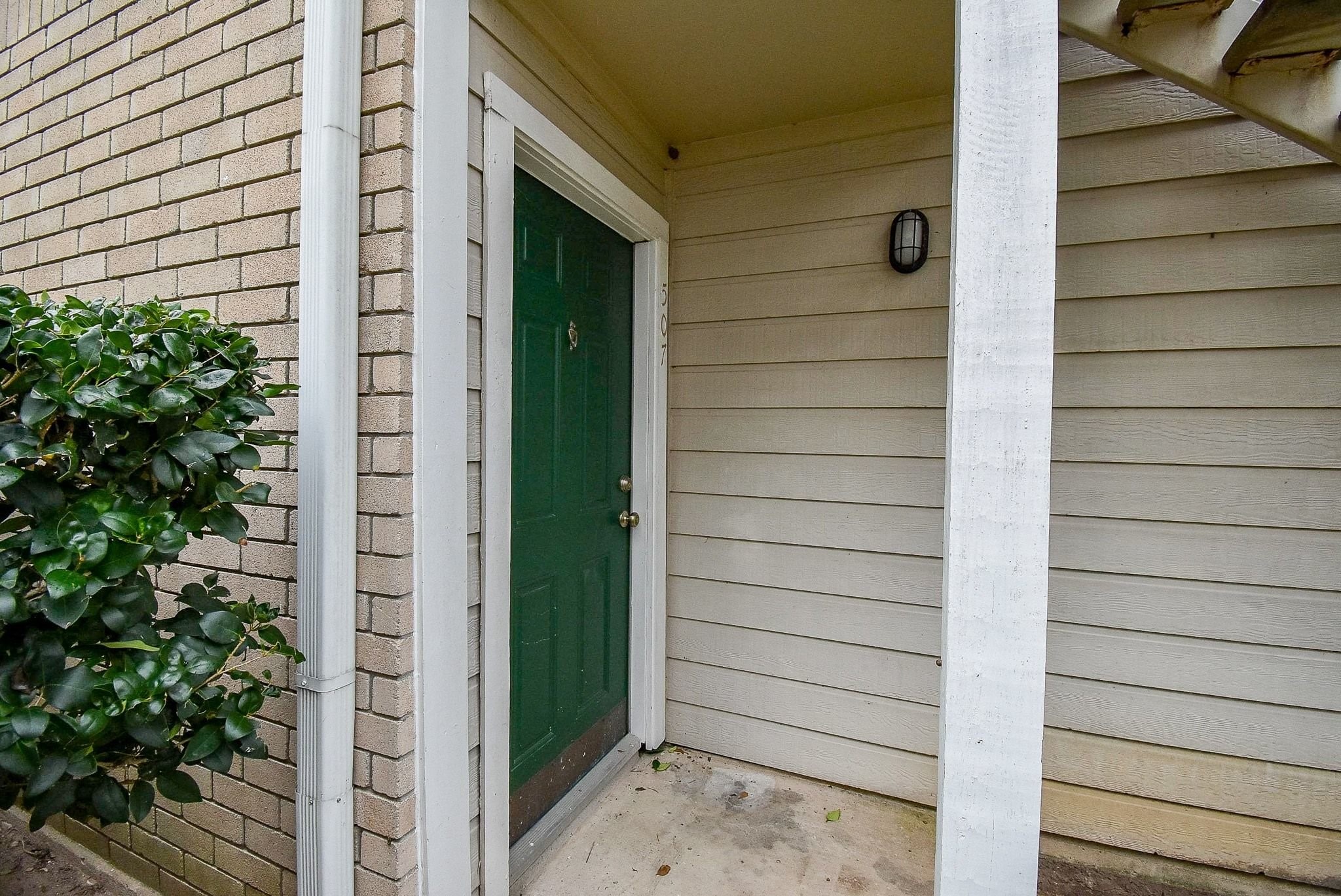 12660 Ashford Point Drive, Unit 507 Houston, TX 77082 - Photo 4 of 28 a view of front door of house
