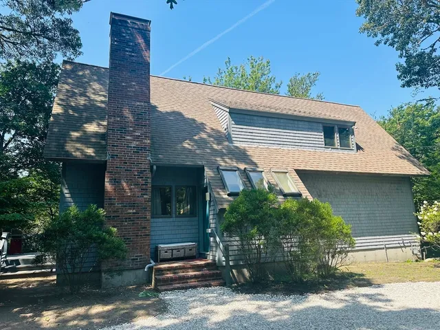 a view of house with outdoor space