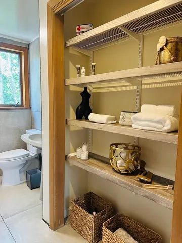 a bathroom with a sink and a toilet