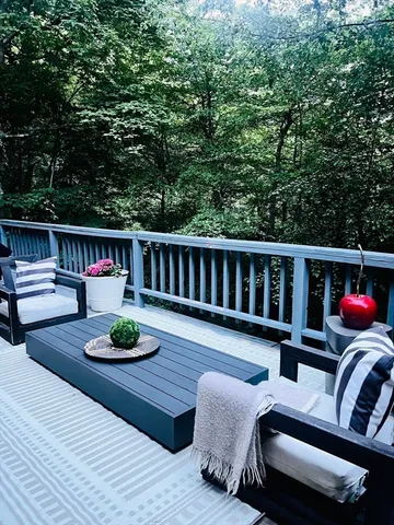 a view of a patio with furniture