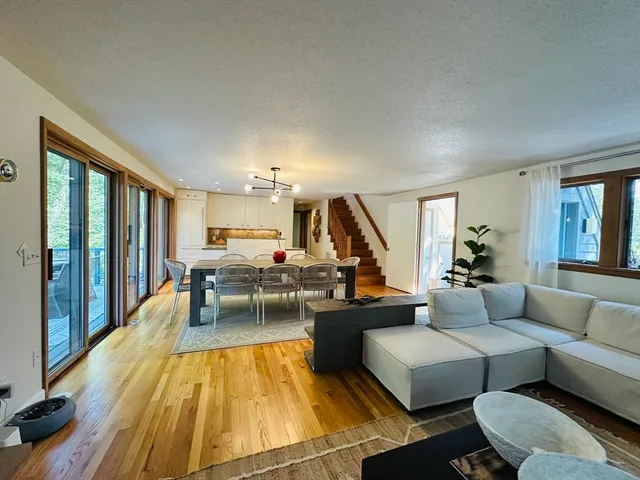 a living room with furniture and a table
