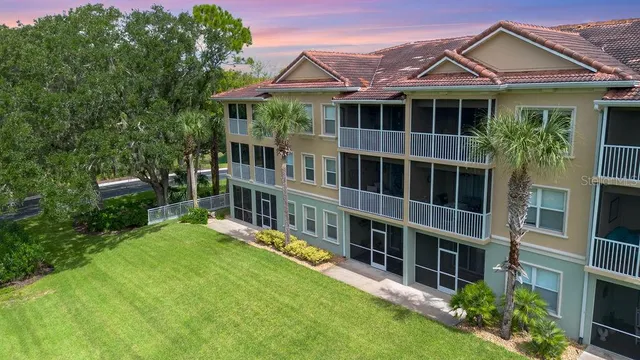 a kitchen with cabinets appliances and wooden cabinets