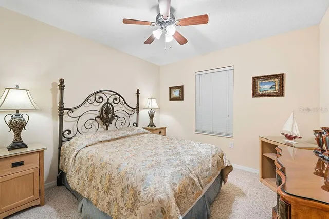 a spacious bathroom with a double vanity sink a mirror and a shower