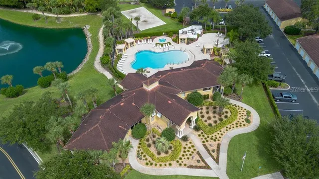 a view of a room that has a table and chairs