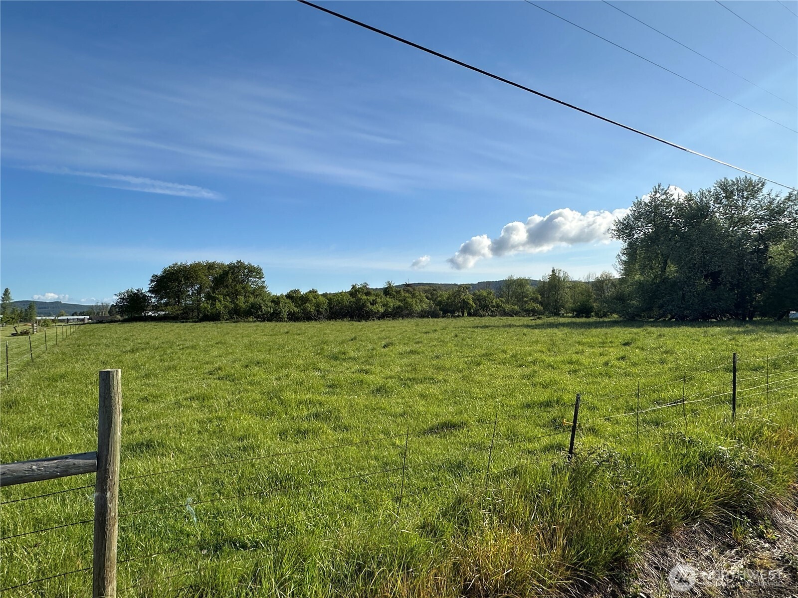 a view of lake with green space