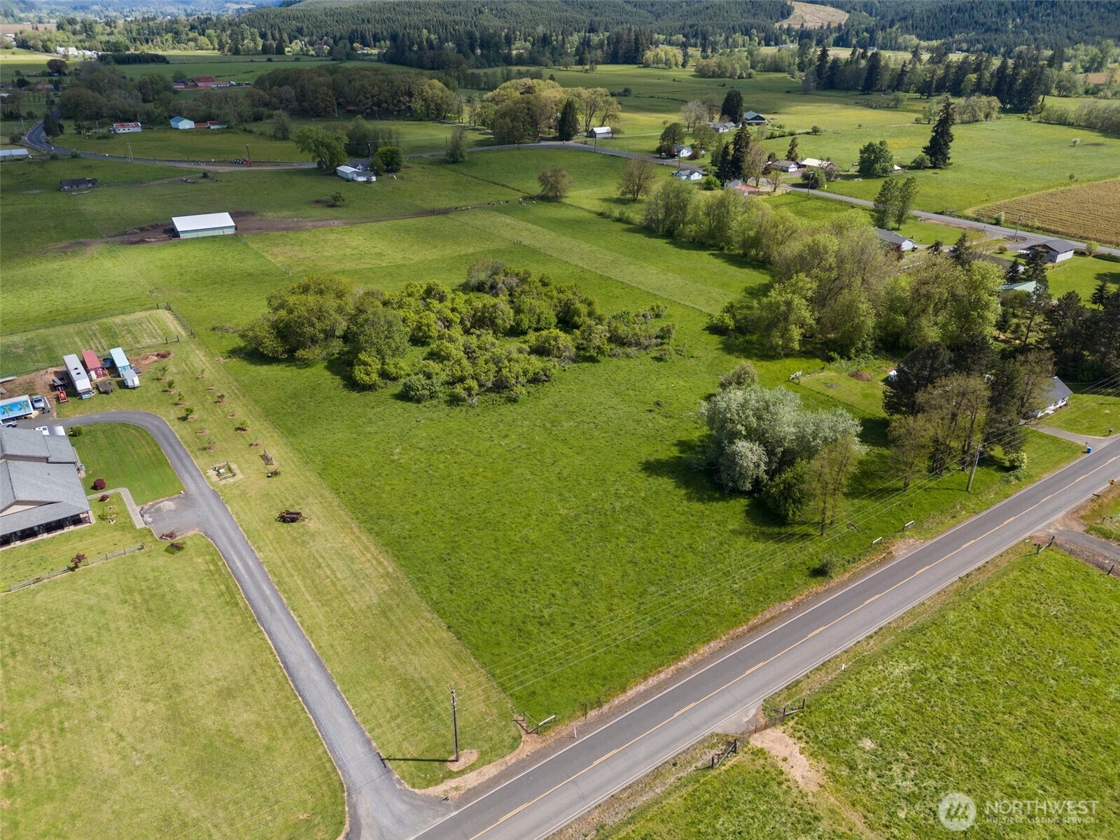 0 Pe Ell McDonald Road Curtis, WA 98538 - Photo 10 of 12 a view of a lake with a large yard