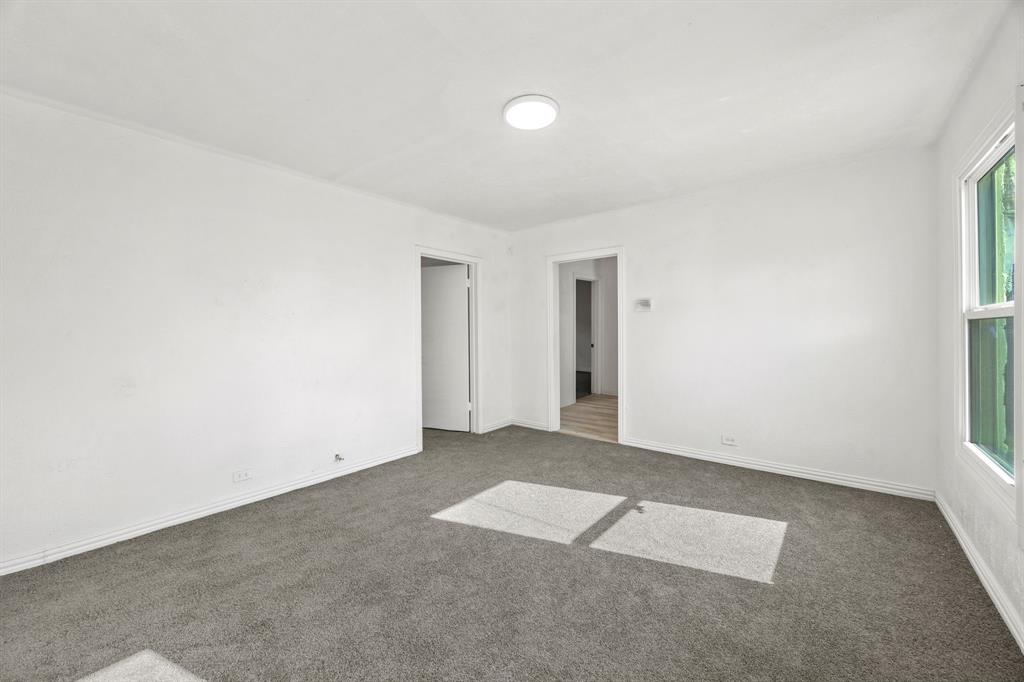 1802 Fordham Road Dallas, TX 75216 - Photo 6 of 25 an empty room with windows