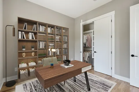 a view of a workspace with furniture