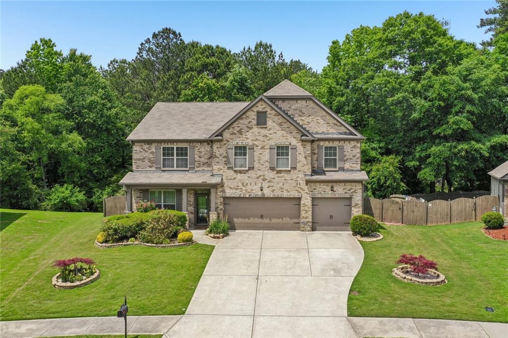 5378 Silverwoods Walk Powder Springs, GA 30127 - Photo 1 of 62 a front view of a house with a yard