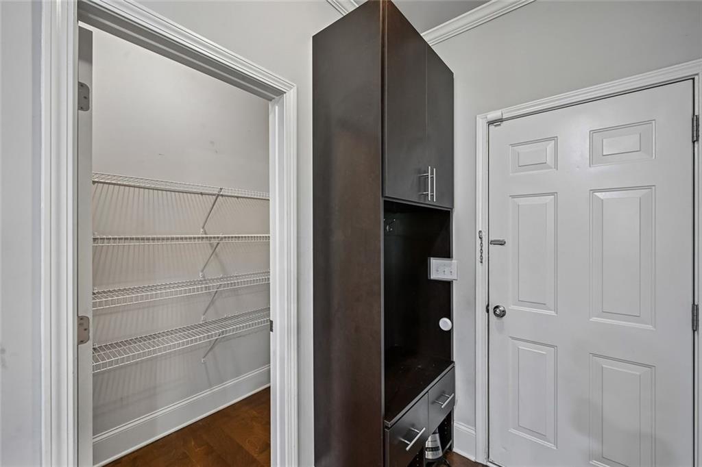 5378 Silverwoods Walk Powder Springs, GA 30127 - Photo 19 of 62 a view of walk in closet with empty racks