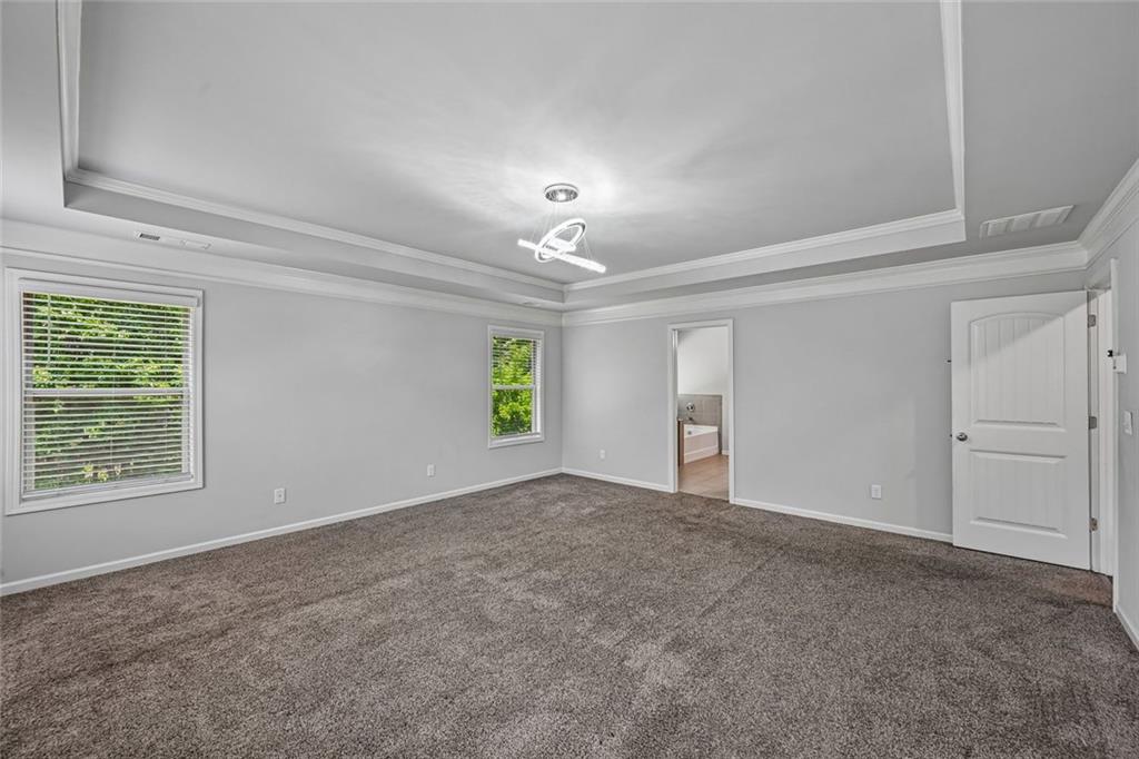 5378 Silverwoods Walk Powder Springs, GA 30127 - Photo 24 of 62 a view of an empty room with a window