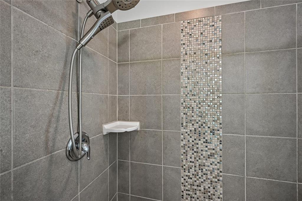 5378 Silverwoods Walk Powder Springs, GA 30127 - Photo 30 of 62 a bathroom with a shower