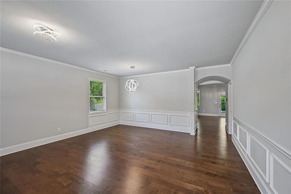 5378 Silverwoods Walk Powder Springs, GA 30127 - Photo 4 of 62 a view of empty room with wooden floor
