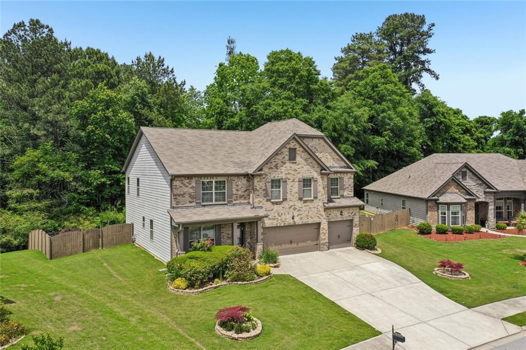 5378 Silverwoods Walk Powder Springs, GA 30127 - Photo 56 of 62 a aerial view of a house next to a yard