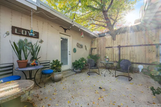 a backyard of a house with seating space