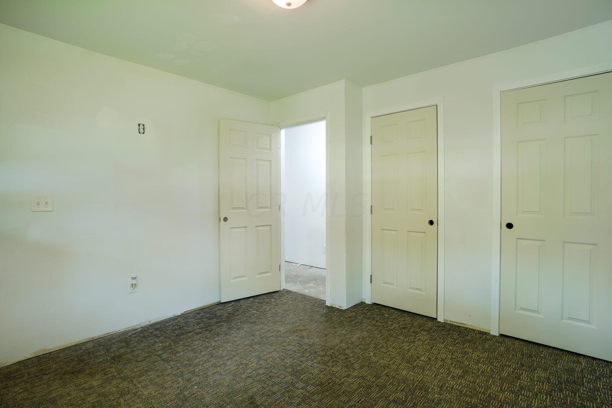 909 Exeter Road Columbus, OH 43213 - Photo 26 of 38 This 4th room has 2 closets with 6 panel doors. Ready for your personal touch.