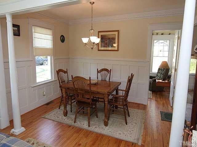 103 Georgetown Road Raleigh, NC 27608 - Photo 3 of 12 Custom wainscotting and millwork was created just for this home. Dining Room