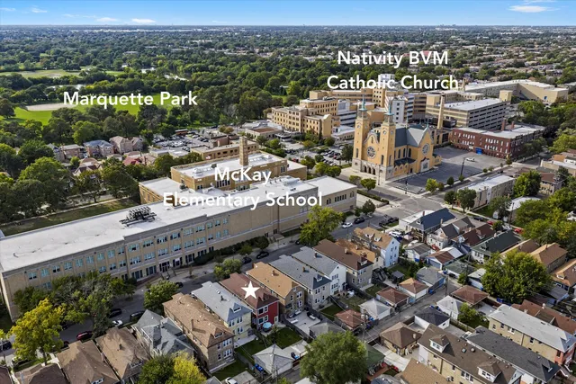 an aerial view of a city with lots of residential buildings