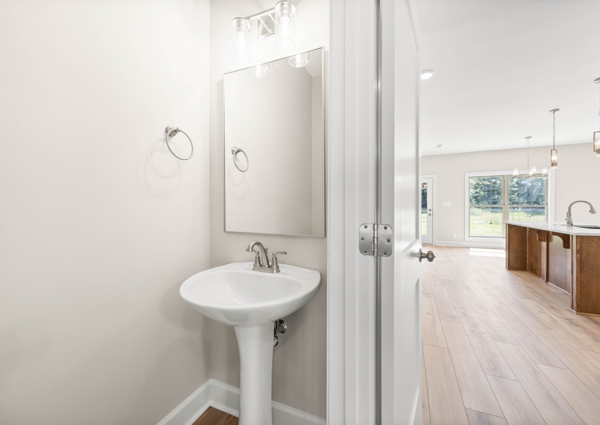 1456 Sango Commons Way Clarksville, TN 37043 - Photo 22 of 49 a bathroom with a sink and a mirror