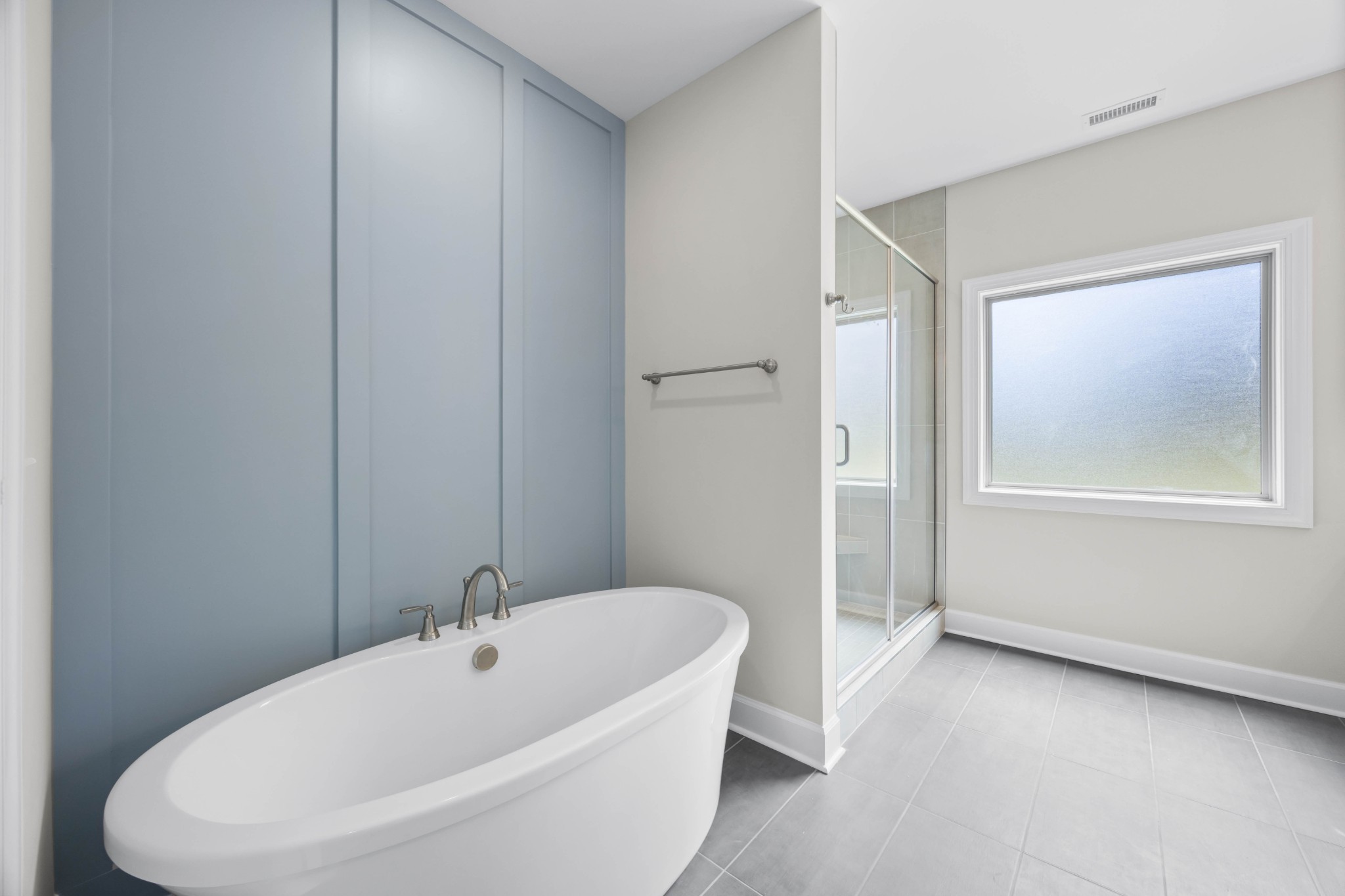 1456 Sango Commons Way Clarksville, TN 37043 - Photo 28 of 49 a bathroom with a bathtub and window